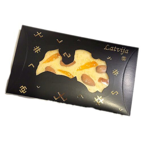 White chocolate with dried apricots, roasted almonds and lemon zest