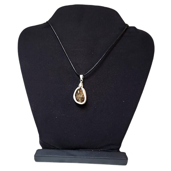 Amber pendant in a leather frame 1202214