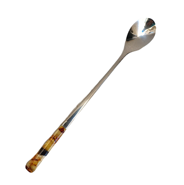 Metal spoon with amber