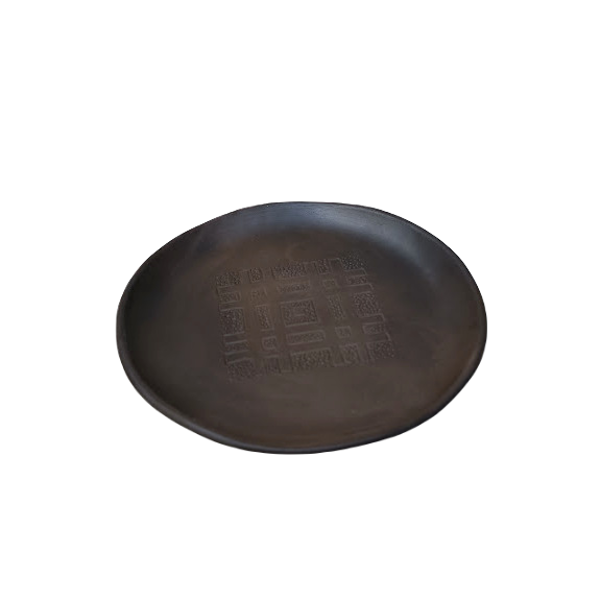 Black clay plate with protective marks